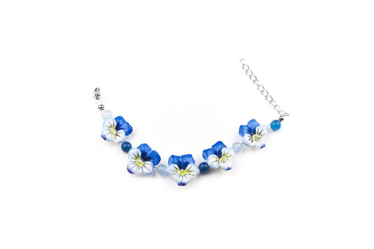 Bracciale con viole del pensiero azzurre