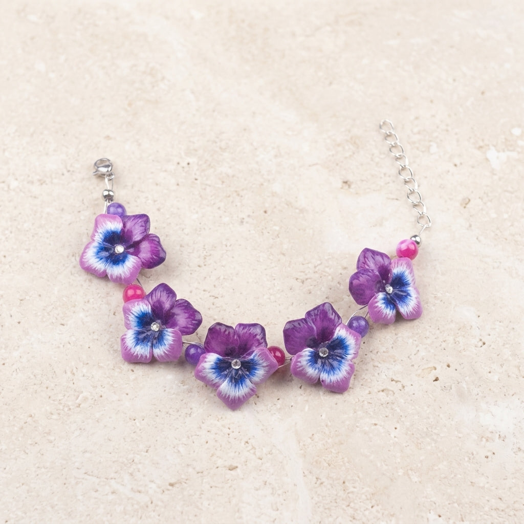 Bracciale con viole del pensiero fucsia